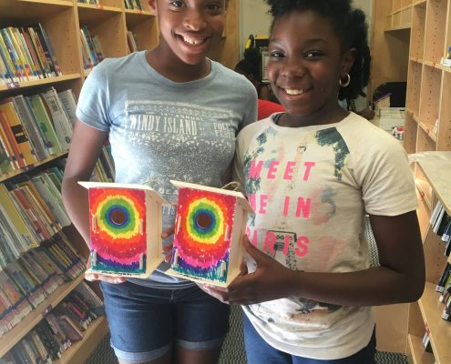 young girls show off birdhouses on MORE